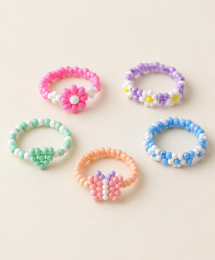 Set of five colorful handmade beaded craft rings